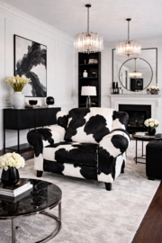 Bommel , loveseat in zwartwit koeienhuid