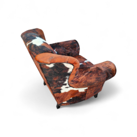 Bommel fauteuil smalle versie  in tricolor koeienhuid