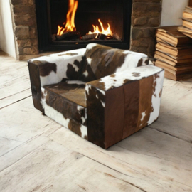 Klaas loveseat in bruinwit  koeienhuid