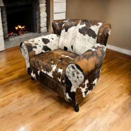 Bommel , loveseat in tricolor koeienhuid