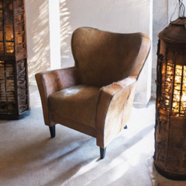 Mickey oorfauteuil in bruin koeienhuid