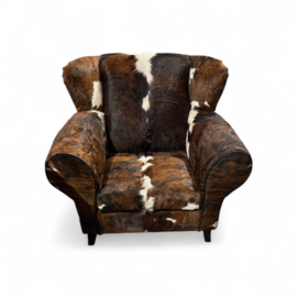 Bommel fauteuil smalle versie  in tricolor koeienhuid