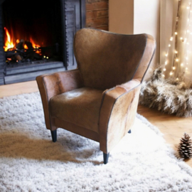 Mickey oorfauteuil in bruin koeienhuid