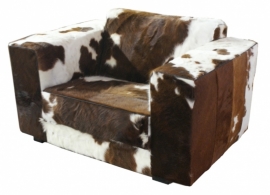 Klaas loveseat in bruinwit  koeienhuid