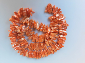 Biwa zoetwaterparel oranje kraal 6-8x20-23.5 mm