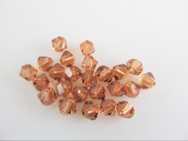 Swarovski Xilion 5328 Kraal Light Smoked Topaz 4 mm