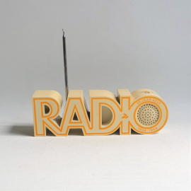 radio letters "RADIO" isis 1984