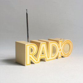 radio letters "RADIO" isis 1984