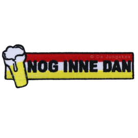 "Nog inne dan" embleem