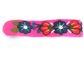 Roze haarband met bloemen