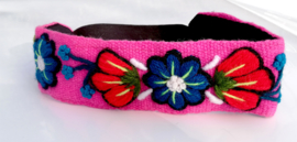 Roze haarband met bloemen