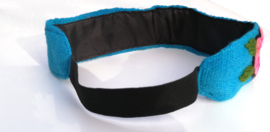 Haarband licht blauw met bloemen