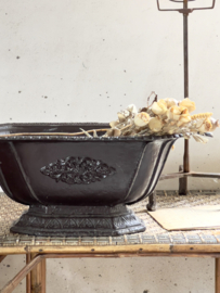 Oude donkerbruine jardinière