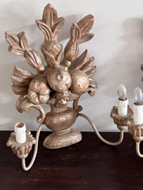 A unique French set of wooden wall sconces/lamps.