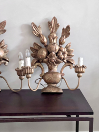A unique French set of wooden wall sconces/lamps.