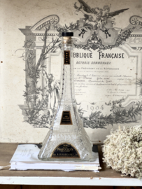 Old brandy Eiffel tower bottle