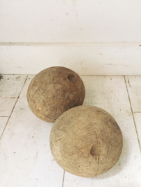 Two antique wooden balls