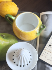 Small old porcelain citrus press