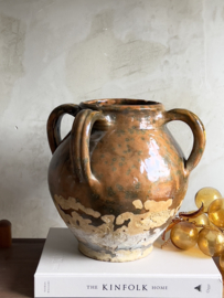 Antique walnut oil jug