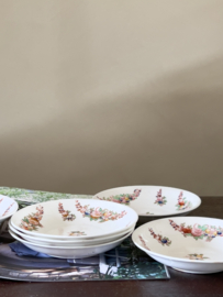Antieke set florale schoteltjes