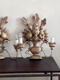A unique French set of wooden wall sconces/lamps.