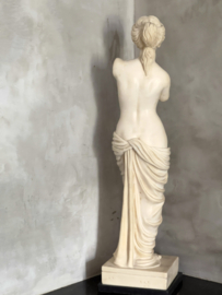 French antique statue on marble foot