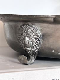 Antique pewter dish on lion feet