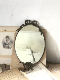 Old oval bow mirror