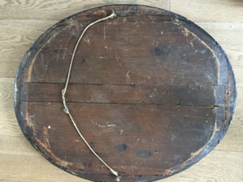 Oval antique mirror