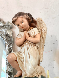 Kneeling angel