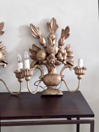 A unique French set of wooden wall sconces/lamps.