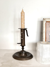 Antique sliding candle holder