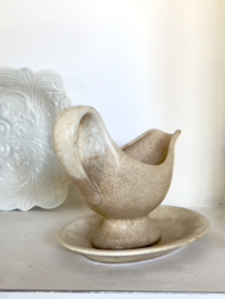 Weathered sauciere