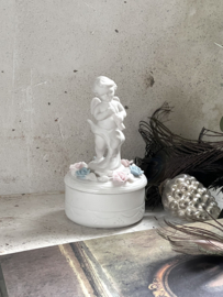 Biscuit porcelain angel pot