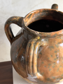 Antique walnut oil jug