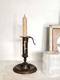 Antique sliding candle holder