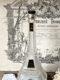 Old brandy Eiffel tower bottle