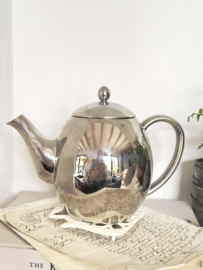 Oude theepot onderzetter