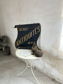 Antique shop advertising signboard