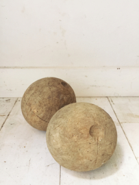 Two antique wooden balls