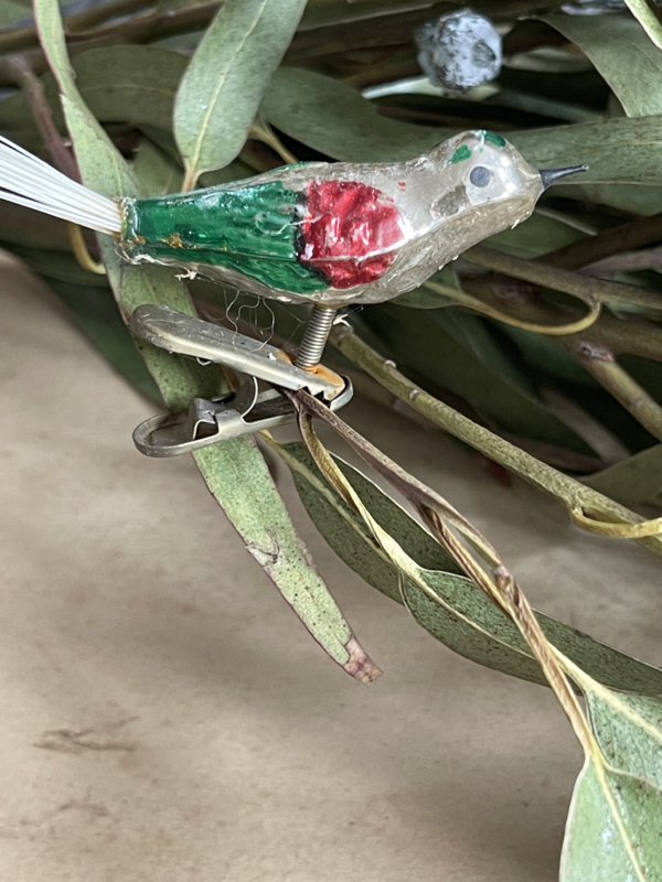 Old glass bird for in the tree