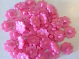 Roze bloemetje. 16 mm per stuk € 0,10