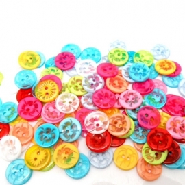 Doorzichtig met bloemen  14 mm. 5 voor € 0,50