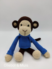 Crocheted monkey denim