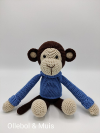 Crocheted monkey denim