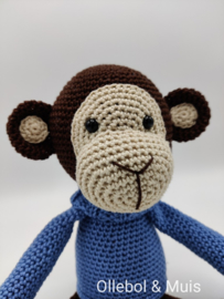 Crocheted monkey denim