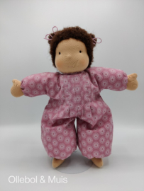 Soft doll pink with brown hair