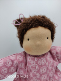 Soft doll pink with brown hair