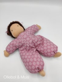 Soft doll pink with brown hair