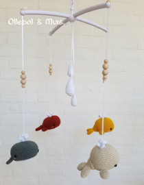 Crochet whales for music mobile